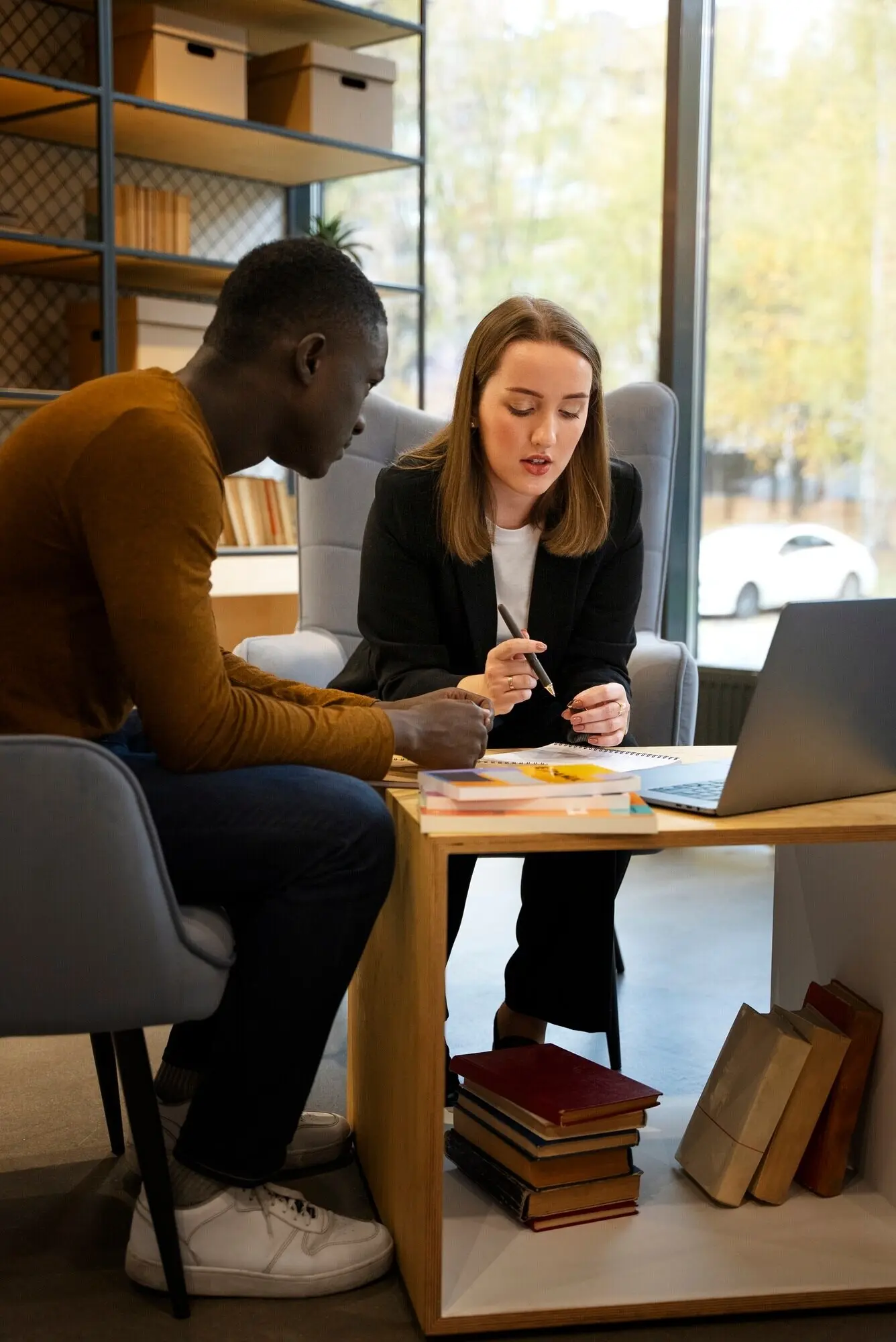 Full shot of people correcting grammar mistakes.